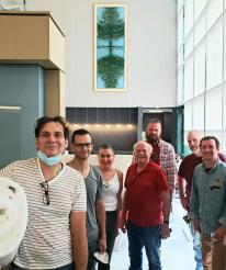 The collaborating crew who installed Pine Tree: INFINITY on June 9, 2022 at MIDB included Benjamin Reed from Ben Reed Art Handling, MIDB’s Art Program Committee Chair Nik Fernholz, collector and donor Dr. Michael Spencer, and the artist Catherine L. Johnson